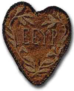 The EEYP Heart of Membership, modeled after the Merit Badge, which signifies the scarifice associated with giving to help others.